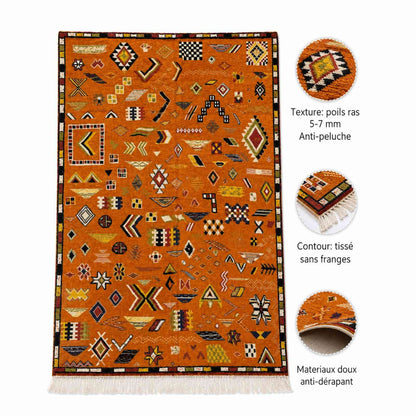 Tapis Akhnif orange terracotta à symboles berbères