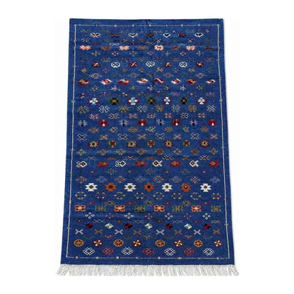 Tapis Akhnif bleu cobalt à semis de symboles berbères
